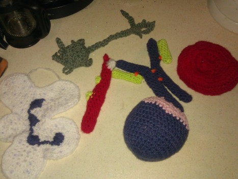 A collection of crocheted cells and an antibody A collection of crocheted cells and an antibody